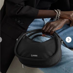 GANNI
Mini recycled leather-trimmed  shell shoulder bag